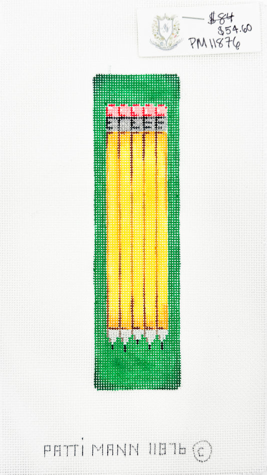 Pencils on Green Background