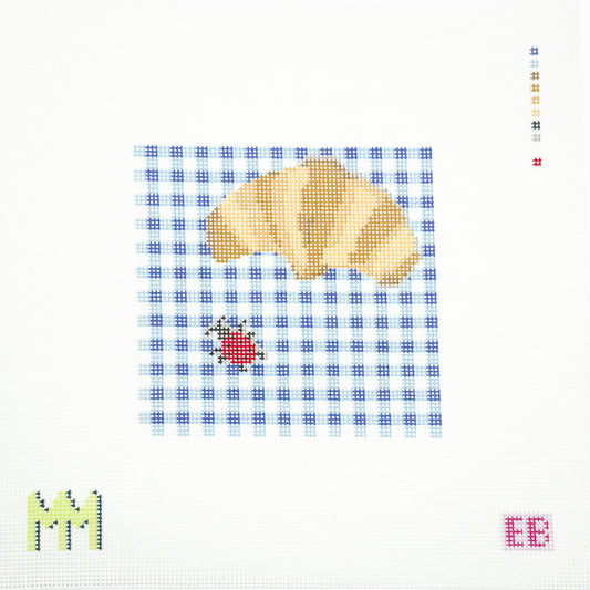 Croissant on Gingham Picnic Blanket